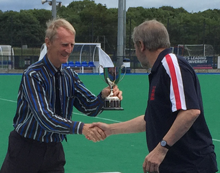 Kieran McLernan presents Clive Hicks with the Great Grand Masters Trophy at the 2015 Home Internationals, Peffermill Edinburgh 12 July 2015